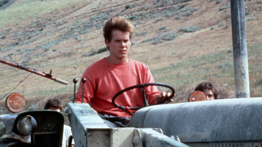 Kevin Bacon no filme Footloose - Ritmo Louco, da Sessão de Sábado