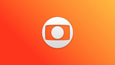 Logotipo da TV Globo em branco sobre um fundo com degradê em tons de laranja e vermelho