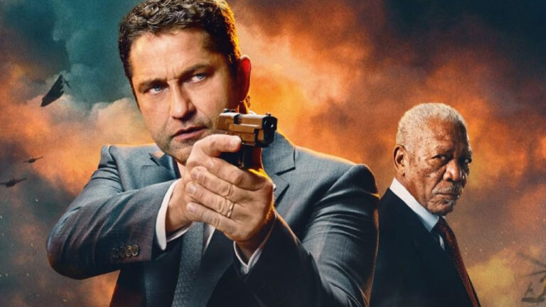 Gerard Butler segurando arma em posição de tiro ao lado de Morgan Freeman em pôster do filme Invasão ao Serviço Secreto de 2019