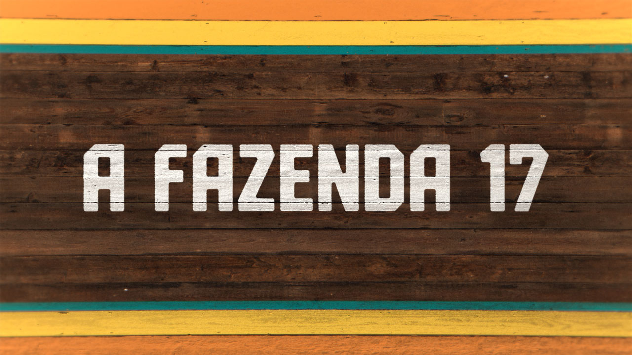 Logo do reality show A Fazenda 17 com fundo de madeira marrom e faixas coloridas em laranja, amarelo e verde exibindo o título em letras brancas