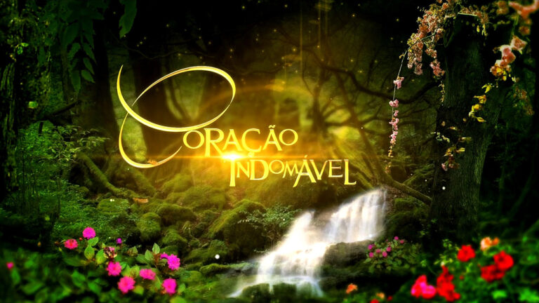 Logo da novela Coração Indomável em letras douradas sobre floresta iluminada com flores e cachoeira ao fundo