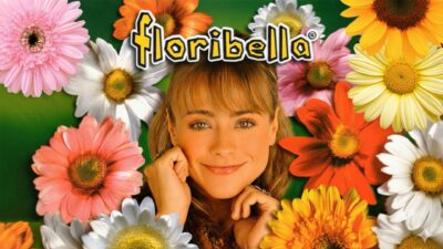 Logotipo da novela Floribella em fundo verde com flores coloridas e Juliana Silveira como Flor sorrindo ao centro