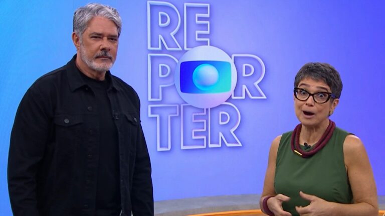 William Bonner e Sandra Annenberg no estúdio do Globo Repórter diante do logotipo do programa exibido ao fundo