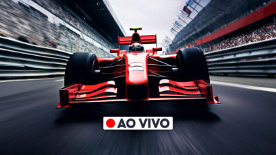 Carro vermelho de Fórmula 1 em alta velocidade durante transmissão ao vivo de corrida em autódromo