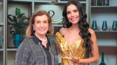 Cris Poli de camisa preta ao lado de Daniela Albuquerque com vestido dourado no Sensacional